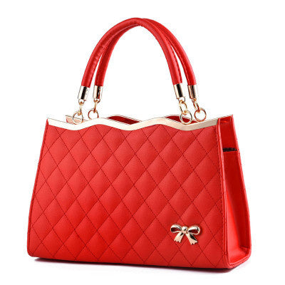 Diamond Patterned Leather Bow Handbag