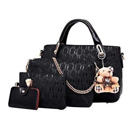 Four Piece PU Leather Solid Color Bag Set