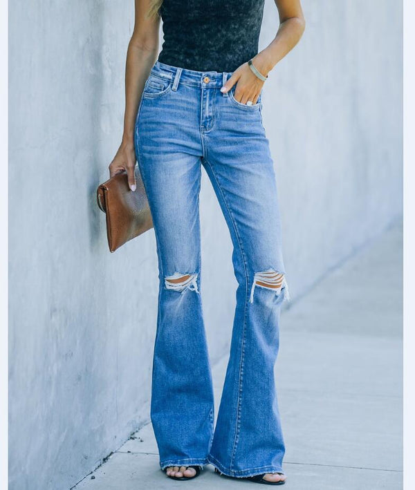 Women's Denim Trousers With Ripped Holes